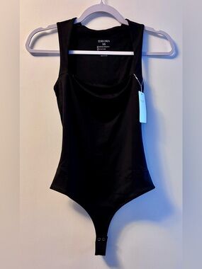 Reoria xs Black One-Piece Bodysuit